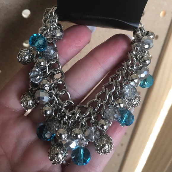 Silver chain bracelet w/aqua,silver,& gray beads.